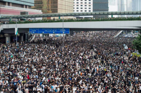 Hong Kong Police Fire Tear Gas, Rubber Bullets At Protesters In "Riot Situation"