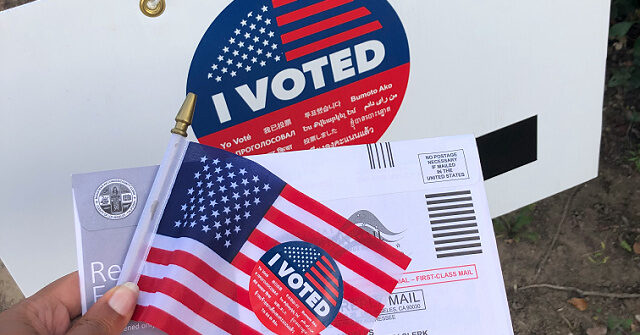 Voting booth with American flag