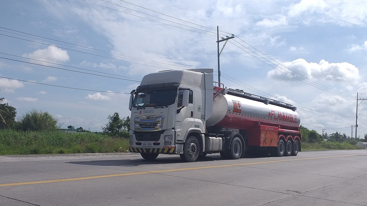 Fuel tanker truck hauling diesel on a highway