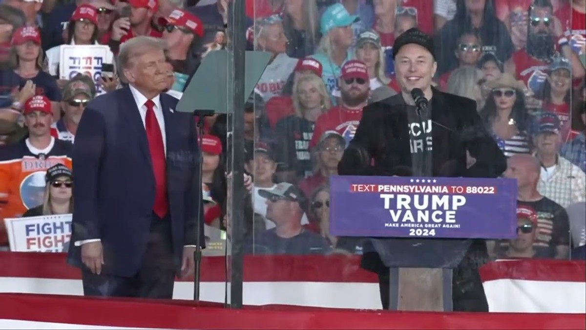 Elon Musk speaking at a Trump rally