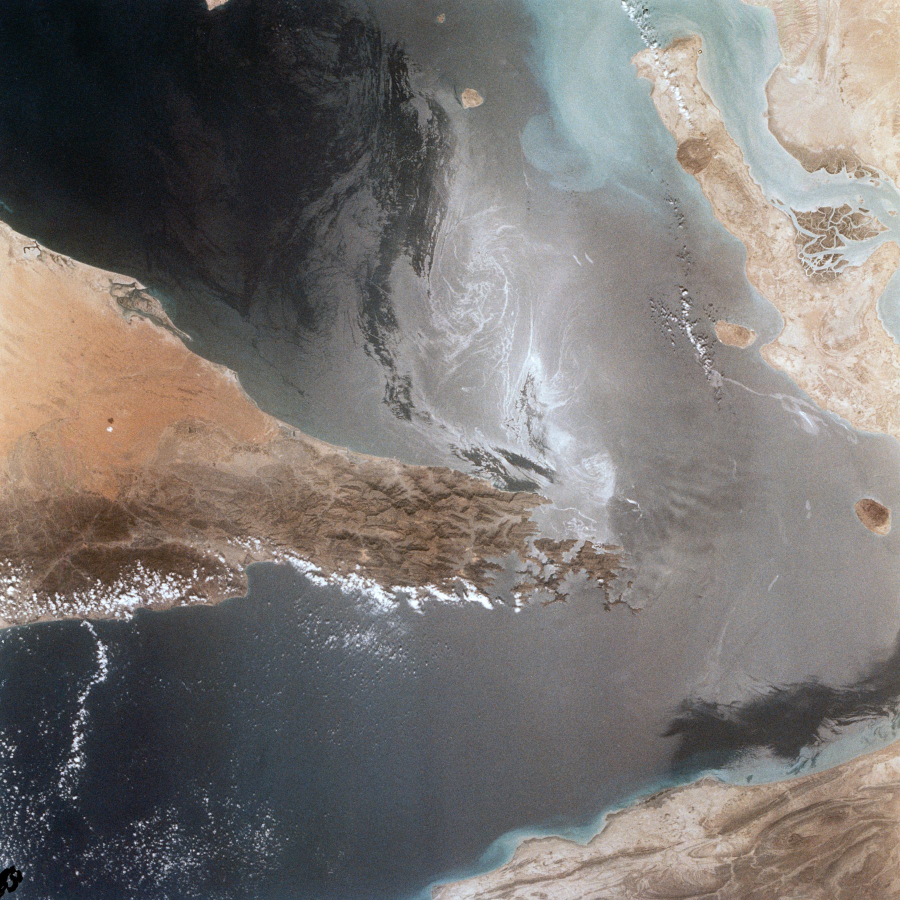 NASA file photo of the Strait of Hormuz with ship wakes