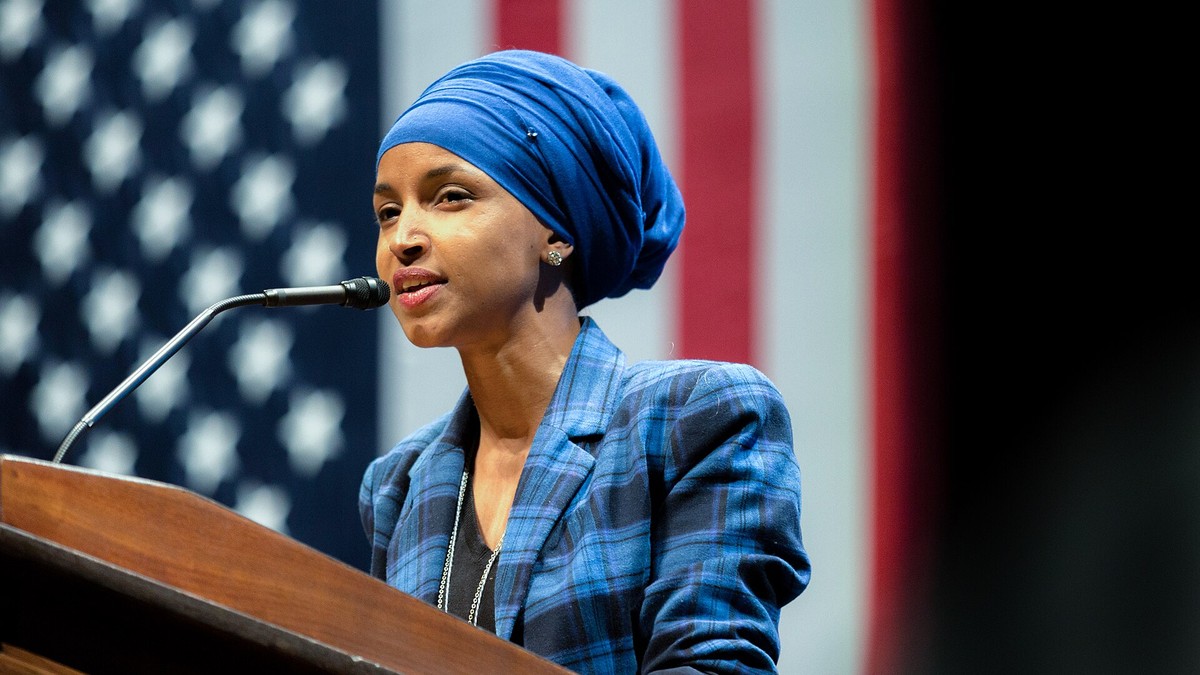 Rep. Ilhan Omar speaking at a podium