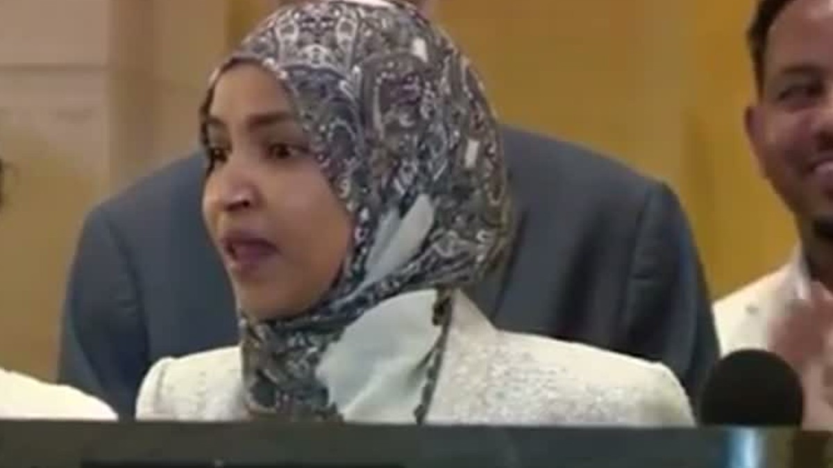 Rep. Ilhan Omar speaking at a podium
