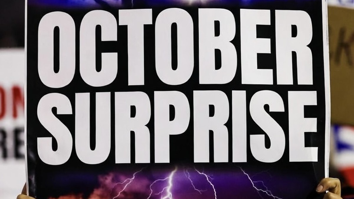 Protest sign reading October Surprise