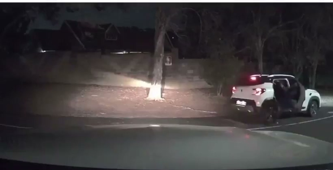Night dashcam frame of the Pinetown, South Africa carjacking attempt