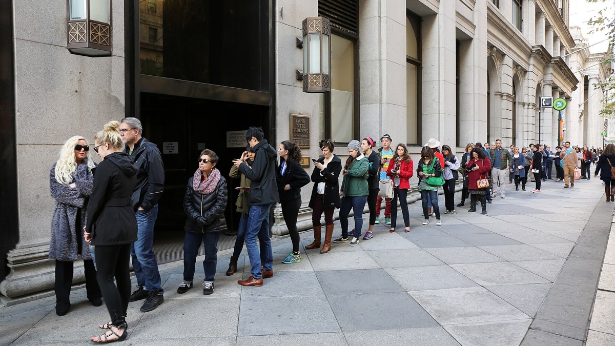 Voters wait in line to cast ballots in Philadelphia (file photo)
